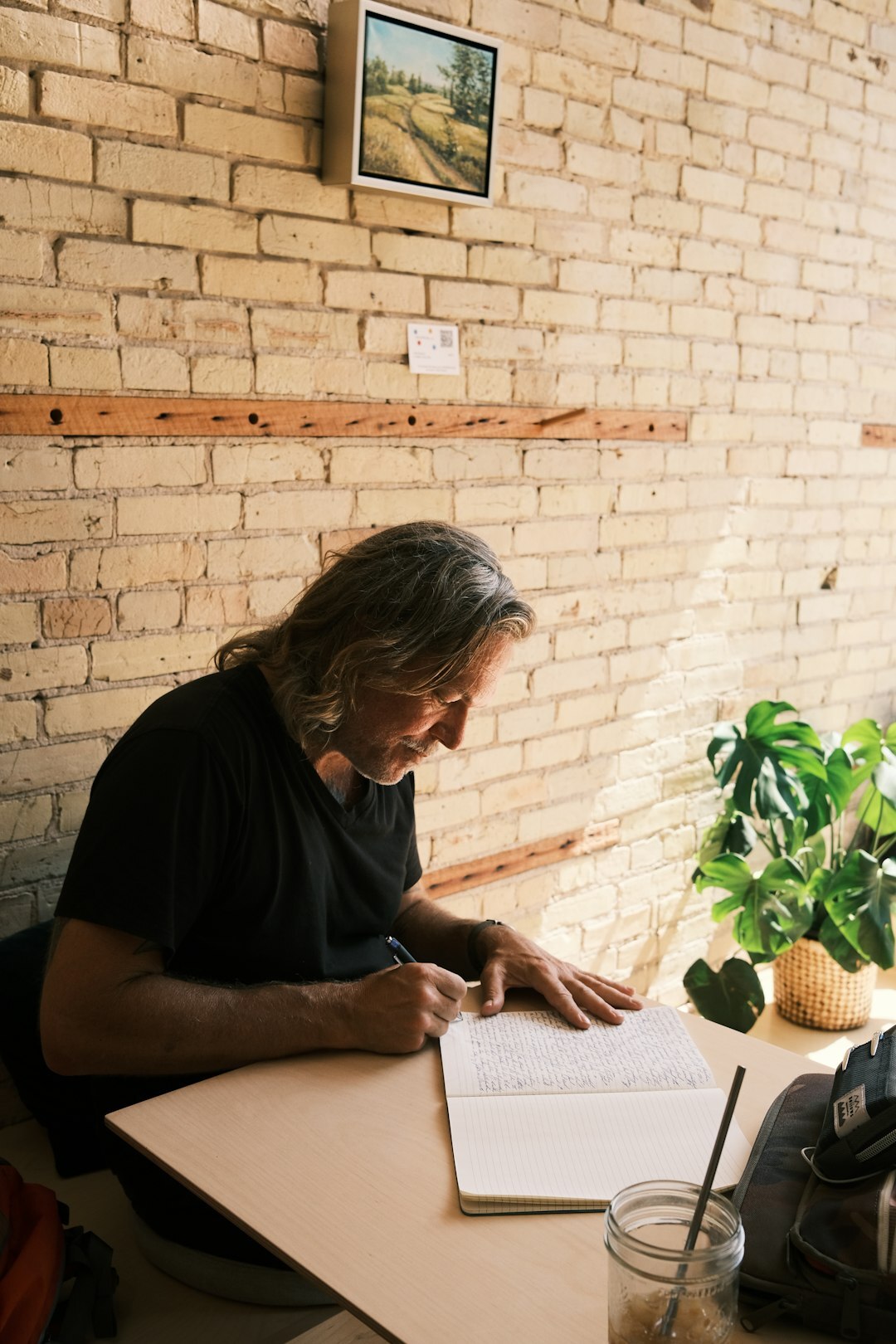 writer at desk with notes